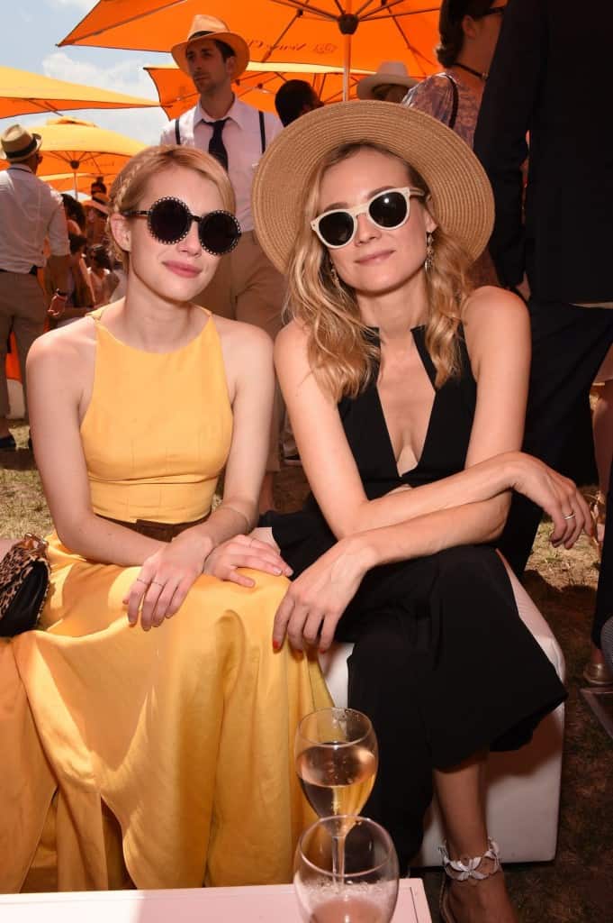 Kruger looked chic in the shade with Emma Roberts. Read more: http://www.businessinsider.com/celebrities-at-veuve-clicquot-polo-classic-2015-6?op=1#ixzz3bvgkLBC5