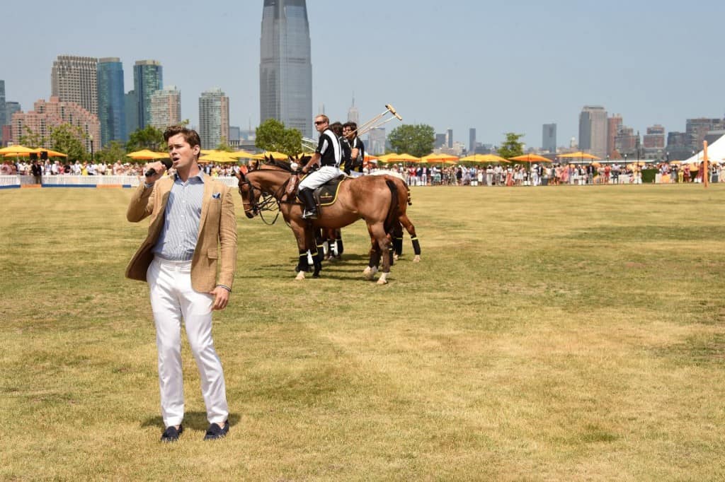 "Girls" and "Hedwig" star Andrew Rannells sang the national anthem before the match. Read more: http://www.businessinsider.com/celebrities-at-veuve-clicquot-polo-classic-2015-6?op=1#ixzz3bvkUPzUt
